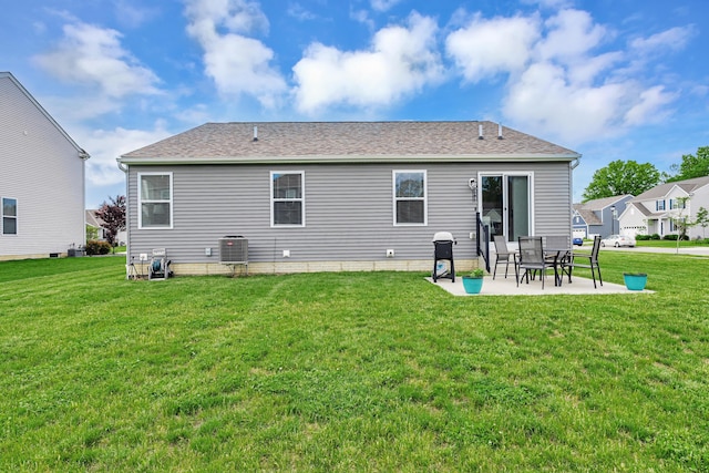 6922 Duke Dr, Canal Winchester, OH 43110 - rear view of house with a yard, a patio, central air condition unit, and a shingled roof