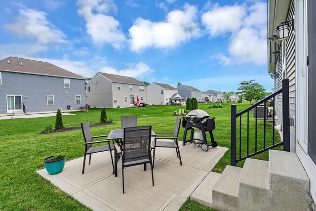 6922 Duke Dr, Canal Winchester, OH 43110 - wooden deck featuring a residential view, outdoor dining area, a lawn, and area for grilling