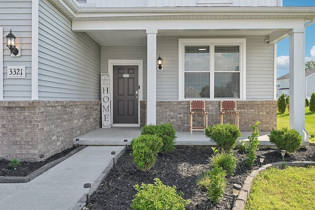 3321 Butternut Ln, Hebron, OH 43025 - property entrance with a porch and brick siding