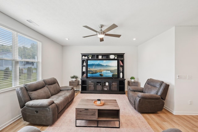 3321 Butternut Ln, Hebron, OH 43025 - living area featuring a ceiling fan, wood finished floors, plenty of natural light, baseboards, and recessed lighting