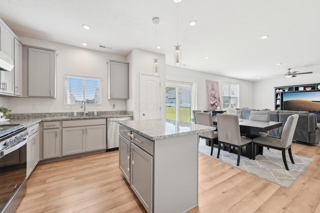 3321 Butternut Ln, Hebron, OH 43025 - kitchen featuring gray cabinetry, appliances with stainless steel finishes, a sink, light wood-style floors, and recessed lighting