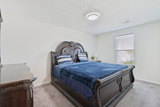 3321 Butternut Ln, Hebron, OH 43025 - carpeted bedroom with baseboards and a textured ceiling