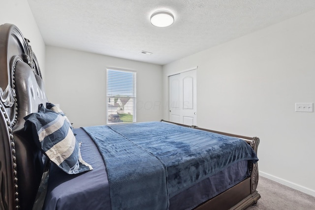 3321 Butternut Ln, Hebron, OH 43025 - carpeted bedroom featuring baseboards and a textured ceiling