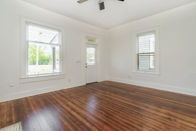 684 Hamlet St, Columbus, OH 43215 - spare room with baseboards, wood-type flooring, and ceiling fan