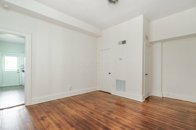 684 Hamlet St, Columbus, OH 43215 - unfurnished room with wood-type flooring and baseboards