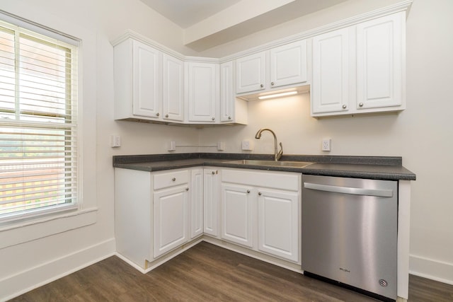 684 Hamlet St, Columbus, OH 43215 - kitchen with dishwasher, a sink, dark wood-style floors, white cabinets, and dark countertops
