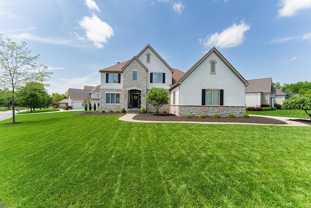 1338 Elkhorn Dr, Blacklick, OH 43004 - view of front of property featuring stone siding, stucco siding, and a front yard