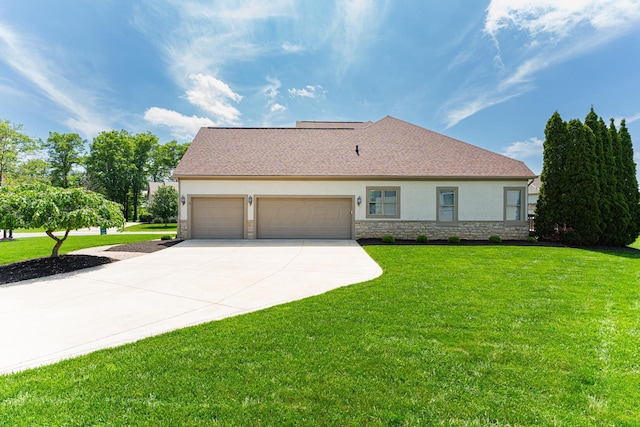 1338 Elkhorn Dr, Blacklick, OH 43004 - view of front of home featuring stone siding, stucco siding, concrete driveway, a garage, and a front yard