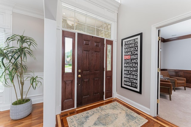 1338 Elkhorn Dr, Blacklick, OH 43004 - entrance foyer with ornamental molding, wainscoting, and wood finished floors