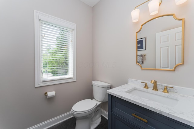 1338 Elkhorn Dr, Blacklick, OH 43004 - half bathroom featuring baseboards, vanity, and toilet