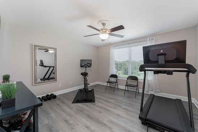 1338 Elkhorn Dr, Blacklick, OH 43004 - exercise area featuring a ceiling fan, light wood finished floors, and baseboards