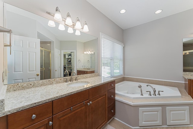 1338 Elkhorn Dr, Blacklick, OH 43004 - full bath featuring a shower stall, vanity, a garden tub, and a walk in closet