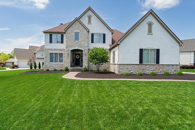 1338 Elkhorn Dr, Blacklick, OH 43004 - french country inspired facade featuring stone siding, stucco siding, and a front yard