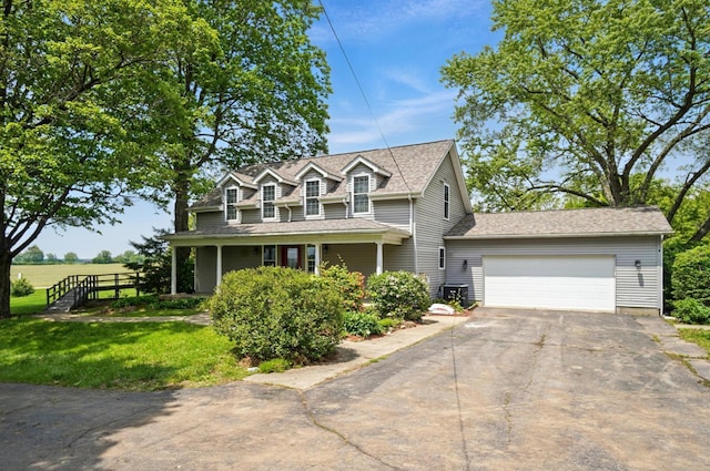 9820 Heimberger Rd NW, Baltimore, OH 43105 - view of front of home featuring driveway, an attached garage, and a shingled roof