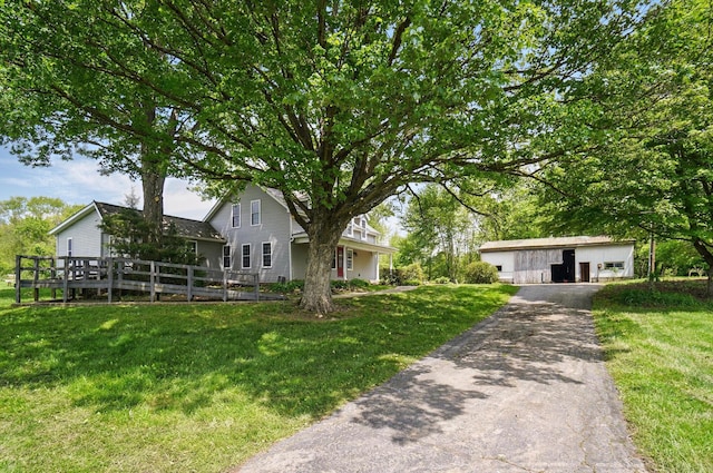 9820 Heimberger Rd NW, Baltimore, OH 43105 - view of front of property with a front yard and a detached garage