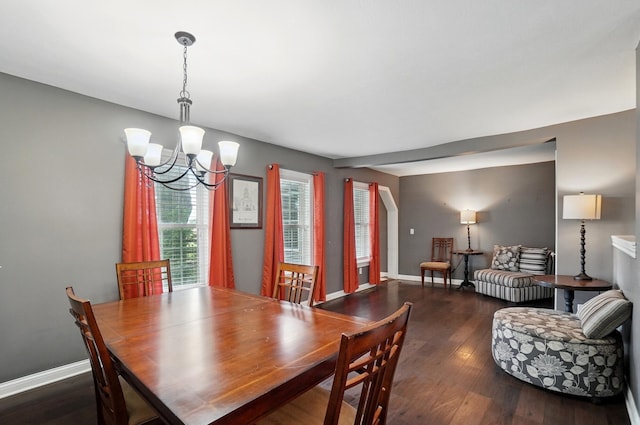 9820 Heimberger Rd NW, Baltimore, OH 43105 - dining area with a chandelier, wood finished floors, and baseboards