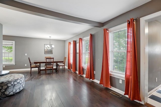 9820 Heimberger Rd NW, Baltimore, OH 43105 - dining room with a chandelier, dark wood-style floors, and baseboards