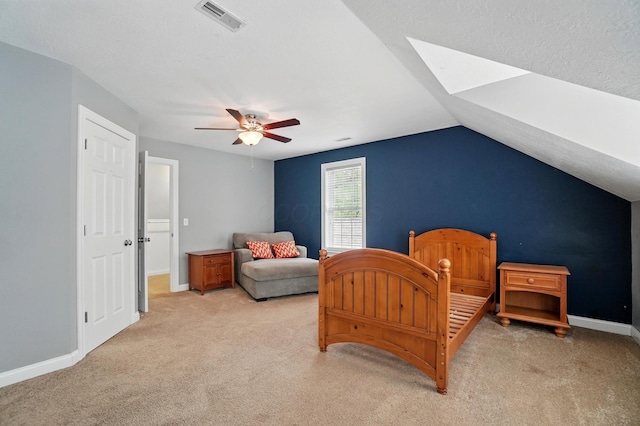 9820 Heimberger Rd NW, Baltimore, OH 43105 - bedroom featuring light colored carpet, a skylight, baseboards, vaulted ceiling, and a ceiling fan