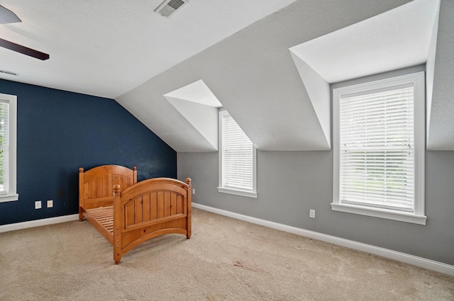 9820 Heimberger Rd NW, Baltimore, OH 43105 - carpeted bedroom with vaulted ceiling, baseboards, and ceiling fan