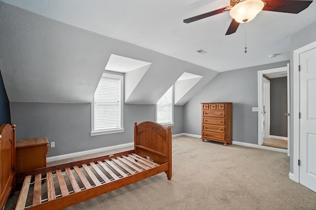 9820 Heimberger Rd NW, Baltimore, OH 43105 - carpeted bedroom with lofted ceiling, a ceiling fan, and baseboards
