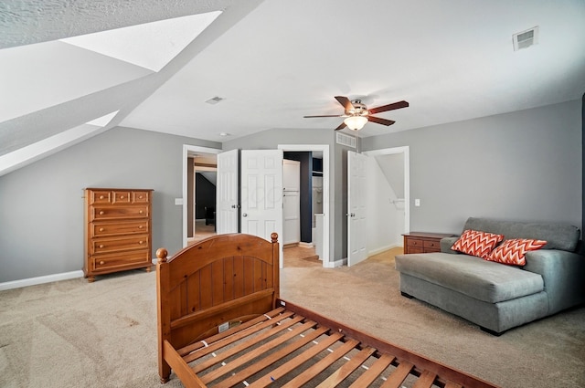 9820 Heimberger Rd NW, Baltimore, OH 43105 - bedroom with light colored carpet, a skylight, baseboards, vaulted ceiling, and ceiling fan