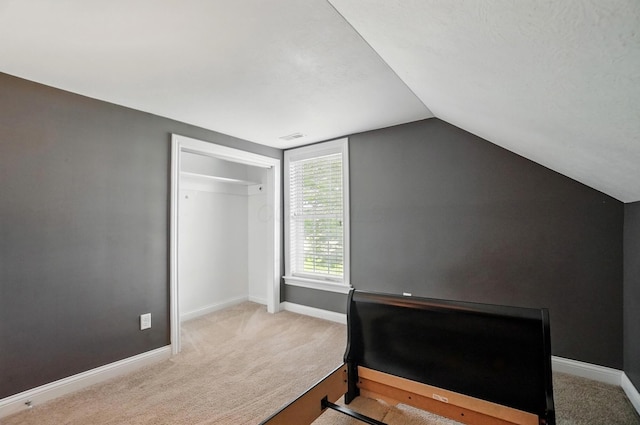 9820 Heimberger Rd NW, Baltimore, OH 43105 - unfurnished bedroom featuring carpet floors, vaulted ceiling, and baseboards