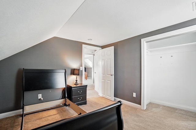 9820 Heimberger Rd NW, Baltimore, OH 43105 - bedroom with light carpet, vaulted ceiling, baseboards, and a desk
