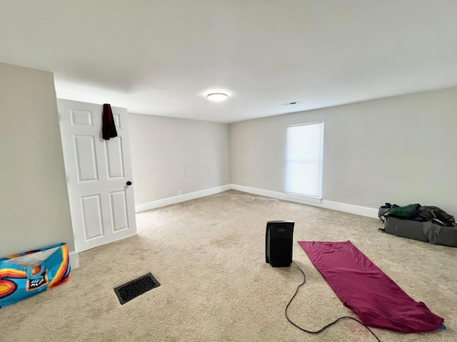 2624 Osceola Ave, Columbus, OH 43211 - workout room with carpet flooring and baseboards