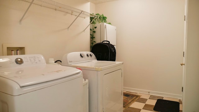 1908 Baltic Ave, Lewis Center, OH 43035 - washroom with washing machine and dryer, light floors, and baseboards
