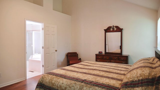 1908 Baltic Ave, Lewis Center, OH 43035 - bedroom with wood finished floors, baseboards, and ensuite bath