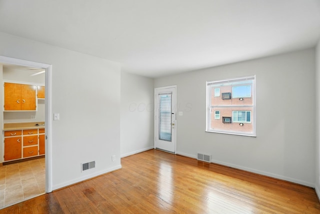 1476-1506 King Ave Unit 1476, Columbus, OH 43212 - spare room with wood-type flooring and baseboards