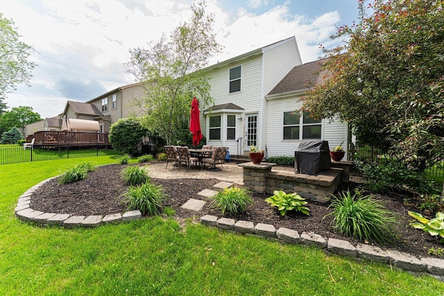 rear view of house featuring a patio area