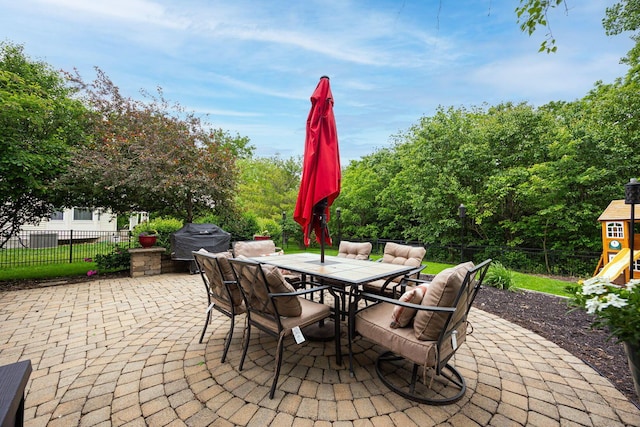 3409 Marl Pl, Columbus, OH 43221 - view of patio / terrace featuring a playground, outdoor dining area, and grilling area