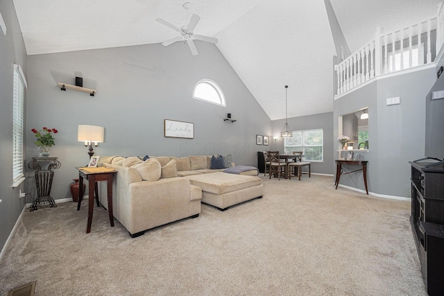 3409 Marl Pl, Columbus, OH 43221 - living room featuring high vaulted ceiling, carpet, ceiling fan, and baseboards