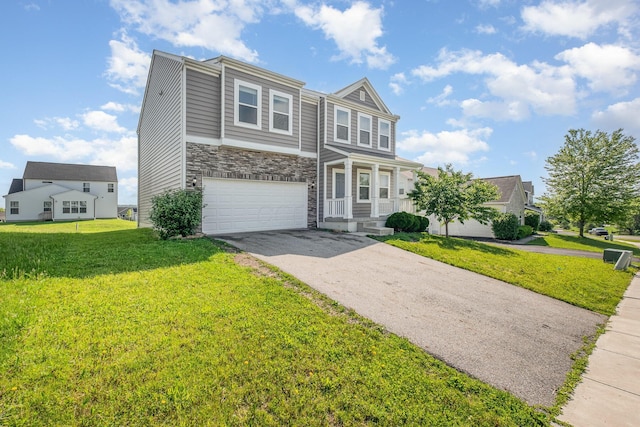 2357 Pine Crest Dr, Lancaster, OH 43130 - view of front of house with stone siding, a garage, asphalt driveway, and a front yard