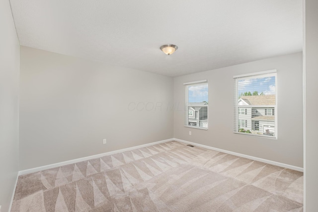 2357 Pine Crest Dr, Lancaster, OH 43130 - unfurnished room featuring light carpet and baseboards