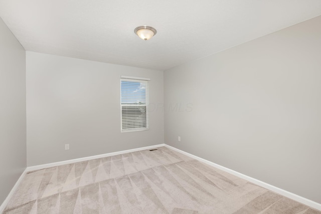 2357 Pine Crest Dr, Lancaster, OH 43130 - carpeted empty room with baseboards