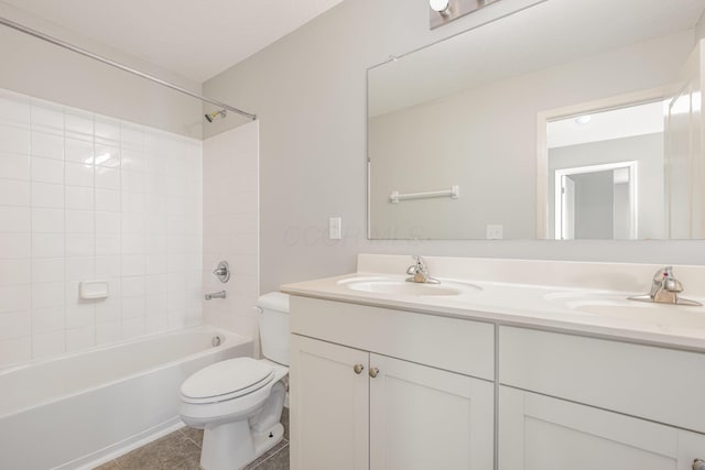2357 Pine Crest Dr, Lancaster, OH 43130 - bathroom with toilet, double vanity, bathing tub / shower combination, and tile patterned floors