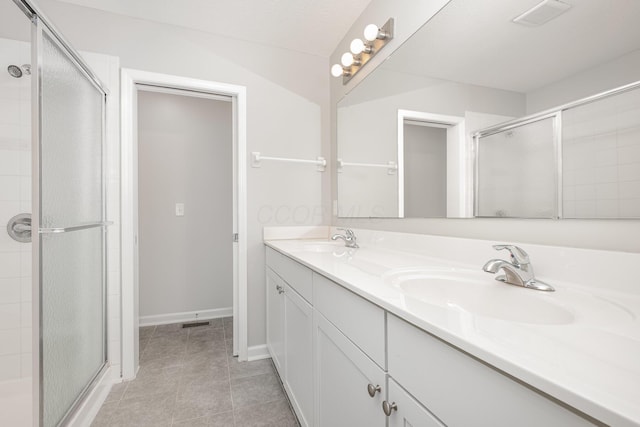 2357 Pine Crest Dr, Lancaster, OH 43130 - bathroom featuring a shower stall, double vanity, and tile patterned flooring