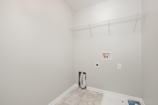 2357 Pine Crest Dr, Lancaster, OH 43130 - laundry room featuring hookup for an electric dryer, washer hookup, and baseboards