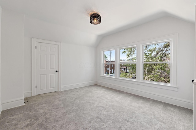 1104 E Whittier St, Columbus, OH 43206 - additional living space with lofted ceiling, carpet, and baseboards