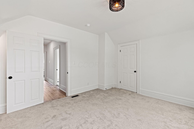 1104 E Whittier St, Columbus, OH 43206 - bonus room featuring carpet flooring, lofted ceiling, and baseboards
