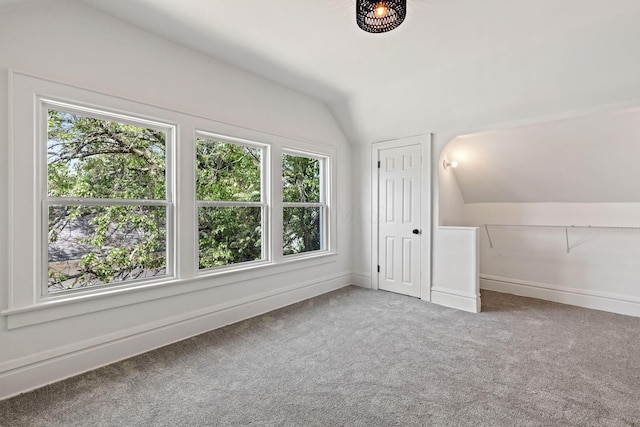 1104 E Whittier St, Columbus, OH 43206 - additional living space with vaulted ceiling, carpet flooring, and baseboards