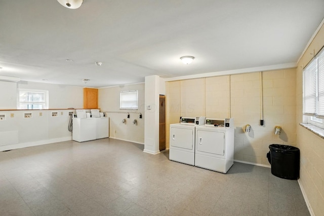 1470 King Ave, Columbus, OH 43212 - laundry room with separate washer and dryer, healthy amount of natural light, and tile patterned floors