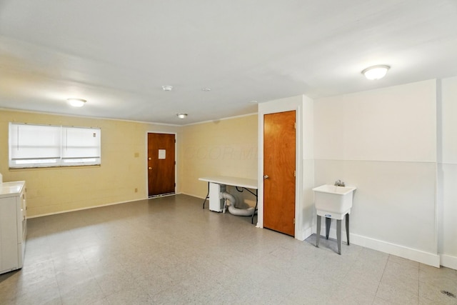 1470 King Ave, Columbus, OH 43212 - unfurnished living room with tile patterned floors, baseboards, and independent washer and dryer