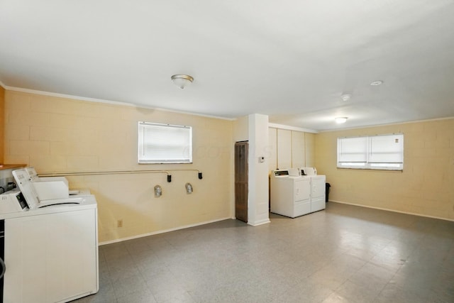 1470 King Ave, Columbus, OH 43212 - shared laundry with washer and clothes dryer, tile patterned floors, concrete block wall, and ornamental molding