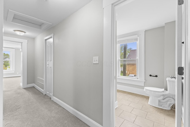 1093 E Long St, Columbus, OH 43203 - hall featuring attic access, plenty of natural light, and baseboards