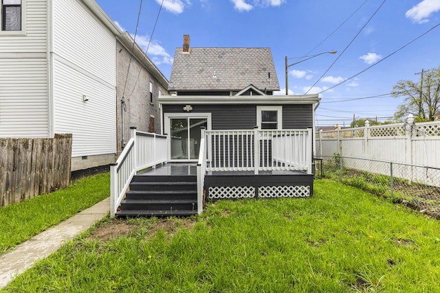 1093 E Long St, Columbus, OH 43203 - back of house featuring a deck and a chimney
