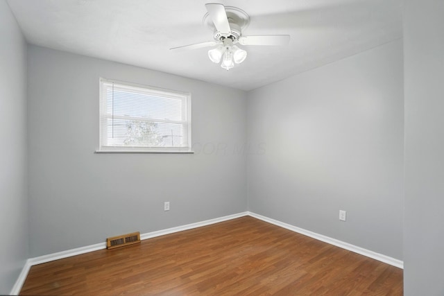 1008 London Rd, West Jefferson, OH 43162 - unfurnished room with wood finished floors, baseboards, and a ceiling fan