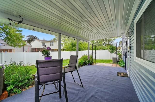 1008 London Rd, West Jefferson, OH 43162 - fenced backyard featuring a patio area, central air condition unit, and outdoor dining space